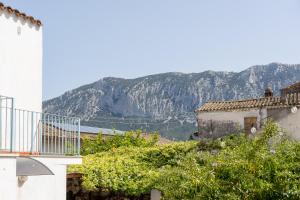 a view of the mountains from a house at S' Istancu Vetzu in Irgoli