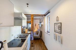 a kitchen with a sink and a counter top at Wohnung 1 in Wallhausen