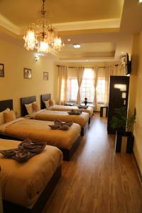 Letto o letti in una camera di Bed and Breakfast Thamel