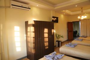 Letto o letti in una camera di Bed and Breakfast Thamel