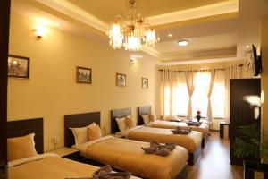 Letto o letti in una camera di Bed and Breakfast Thamel