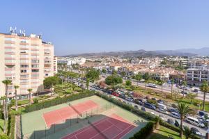 an aerial view of a tennis court in a city at Great views studio A84 in Torrox