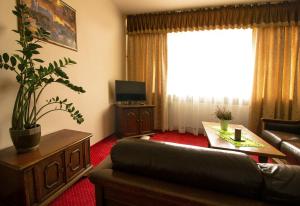 TV a/nebo společenská místnost v ubytování HotelsLublin