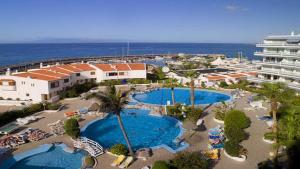 an aerial view of a resort with two pools at Magnific 3-bedroom beach Bungalow in Adeje