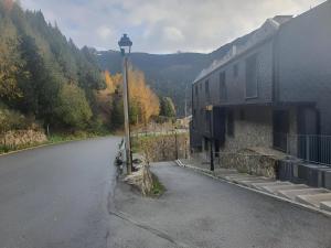 a street light sitting on the side of a road at Altissim Font de Ferro in Ransol
