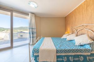Krevet ili kreveti u jedinici u okviru objekta Villa Chia Dream - Blue Retreat +31 fotografija
