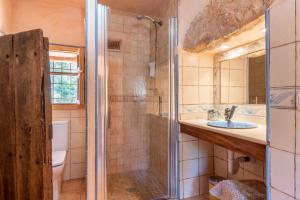 a bathroom with a shower and a sink at Can Bonjesus in Felanitx +17 photos