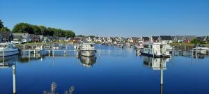 a group of boats are docked in a harbor at Haus Abendsonne in Wandlitz