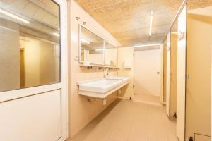 a bathroom with a sink and a mirror at Rectoria de Claverol in Claverol +22 photos