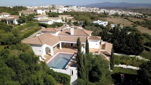 an aerial view of a house with a swimming pool at Villa Muscari in Benalup Casas Viejas