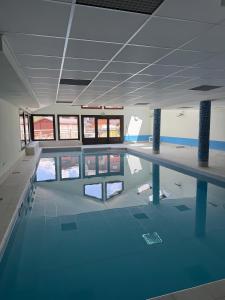 an overhead view of a swimming pool at Studio Edelweiss proche Megeve in Flumet +21 photos