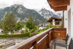 a balcony with a view of mountains at Mountainlodge in Leutasch