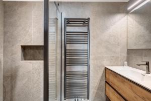 a bathroom with a shower and a sink at Casa Colìn in Bresimo +22 photos