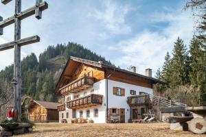 a large house with balconies on the side of it at Thomasegg Hof Birke in Sarntal