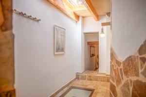 a hallway of a house with a picture on the wall at Casa Sol y Luna in Artá +24 photos