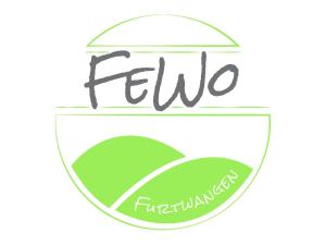 a logo for a fertilizers company with the word feni at Fewo Furtwangen in Furtwangen