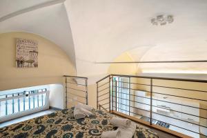 a bedroom with a large bed and a window at Conchiglia, borgo dei pescatori in Cervo