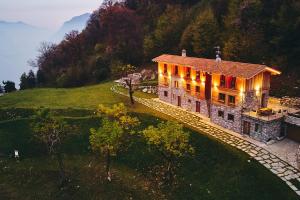 an aerial view of a house on a hill at Bellagio - Baita treeb Breva in Bellagio