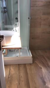 a bathroom with a shower and a sink at Casa Nessi- Stanze in Platamona +53 photos