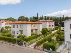 a view from the balcony of a house at Castiglioncello Mare Apartment in Castiglioncello