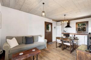 a living room with a couch and a table at La Casa de Abajo in Valverde