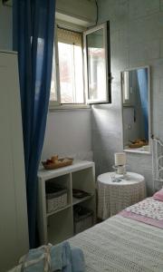 Posteľ alebo postele v izbe v ubytovaní Casa sul Mare vicino Marzamemi