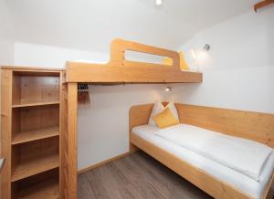 Posteľ alebo postele v izbe v ubytovaní Ferienhaus Gerlinde II