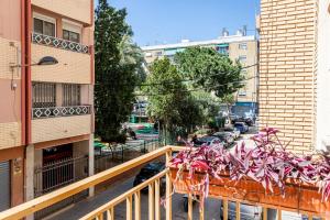 a balcony with a bunch of pink candy canes at San Antonio in Sedaví