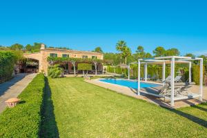 an estate with a swimming pool and a house at Es Rafal in Santa Margalida