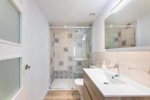 a bathroom with a sink and a toilet at Albercutx Pollentia 2 in Port de Pollensa +19 photos