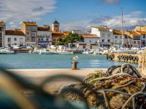 a view of a harbor with boats in the water at Port-la-Nouvelle 4p in Port-la-Nouvelle