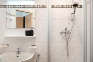a bathroom with a shower and a sink at Apartment Tux in Mayrhofen +20 photos