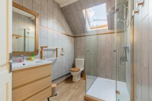 a bathroom with a shower and a toilet at La Pause Picarde - Baie De Somme 2 in Franleu +23 photos