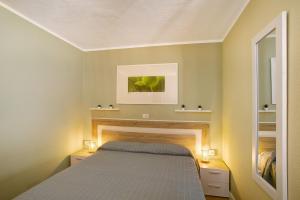 a bedroom with a bed and a fireplace at Zen House in Puerto Rico de Gran Canaria +16 photos