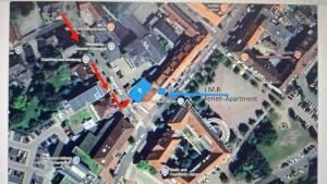 a map of a city with a red arrow at Jmr in Uelzen