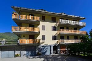 a building with balconies on the side of it at Maison Wanda La Salle in La Salle