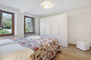 Llit o llits en una habitació de Maison Sandra