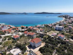 an aerial view of a city and the ocean at Sevid Seaview Apartments in Sevid