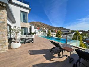 a patio of a house with a swimming pool at Barcelona 11 in Finestrat