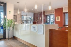 a restaurant with a counter in a room at Residence Alpenrose in Col di Villa +79 photos