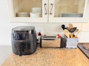 a coffee maker on a counter in a kitchen at LaMer No 5 in Stilbaai