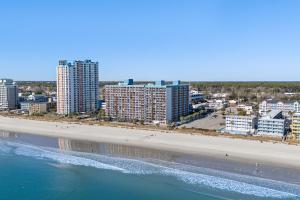 an aerial view of a beach with hotels and buildings at Landmark Resort Ocean View Beach Pools Villa in Myrtle Beach
