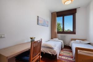 a room with two beds and a window at Casa Andrea in Venice