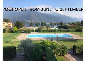 a swimming pool open from june to september at Casa vacanze vigna del Lago in Dongo