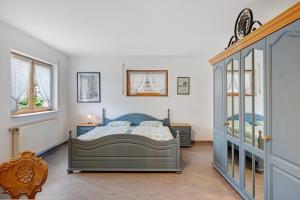 a bedroom with two beds in a room at Ferienwohnung am Steinbach in Albstadt