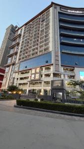 a large building with a lot of windows at Skyline suites in Noida