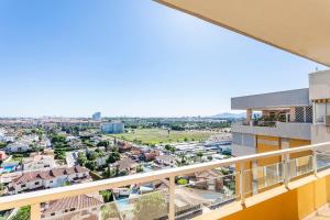 a view of the city from the balcony of a building at Ático en Canet-playa in Canet de Berenguer