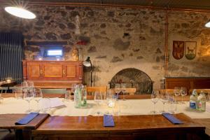 a table with wine glasses on top of it at Fewos Weingut Pieper Basler in Offenburg