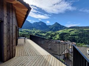 a balcony with a view of mountains at Aumia Apartment Turmalin in Völs am Schlern