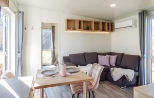 a living room with a couch and a table at Haus Laura in Untergriesbach